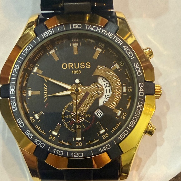 Oruss Other - #68 Gold and Black ORUSS Watch with elegant style.